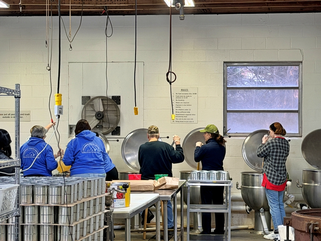 People processing food at the Prince Edward County Cannery