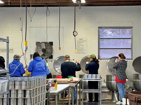 People processing food at the Prince Edward County Cannery