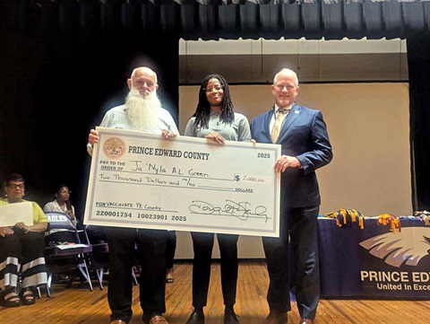 Press Release - 2005 Graduate Ja'Nyla Green Receives Vaccinate Prince Edward Scholarship Check